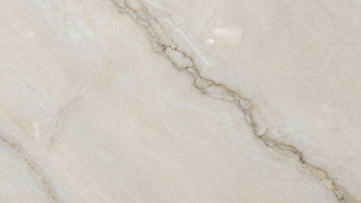 Elegant White Macaubas quartzite surface with natural veining.