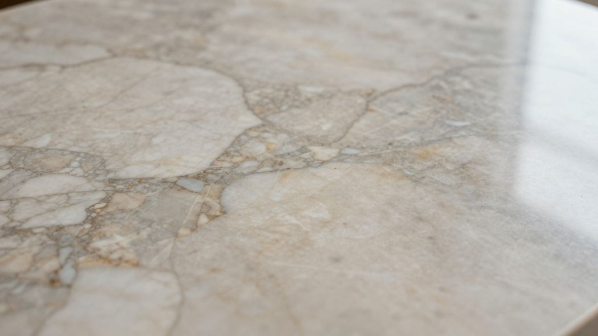 Polished marble countertop with intricate veining patterns.