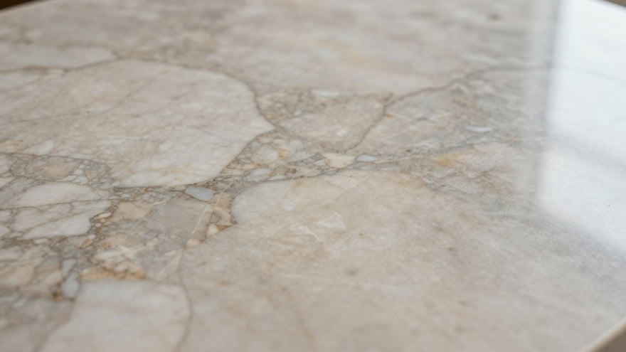 Polished marble countertop with intricate veining patterns.