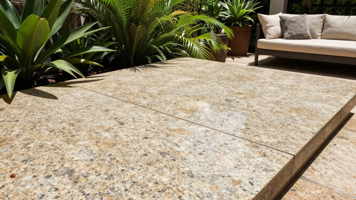 Granite slab patio with plants and seating.
