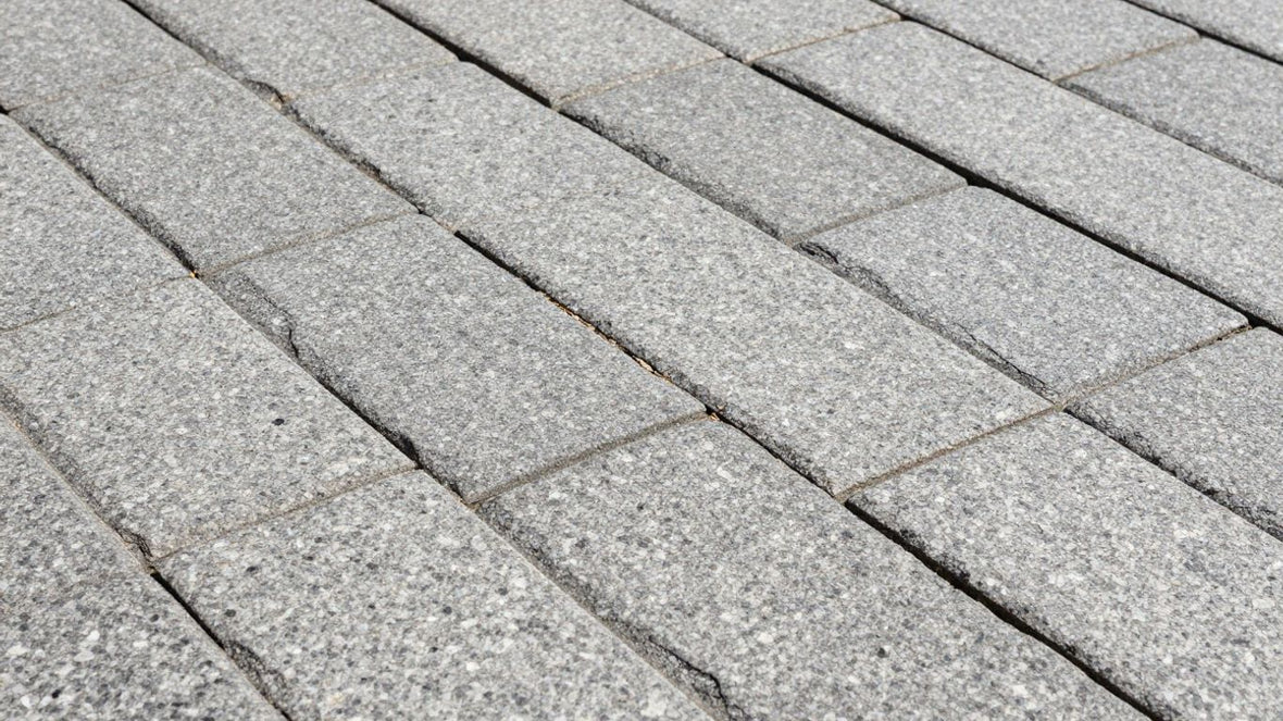 Granite paving stones in an outdoor patio setting.