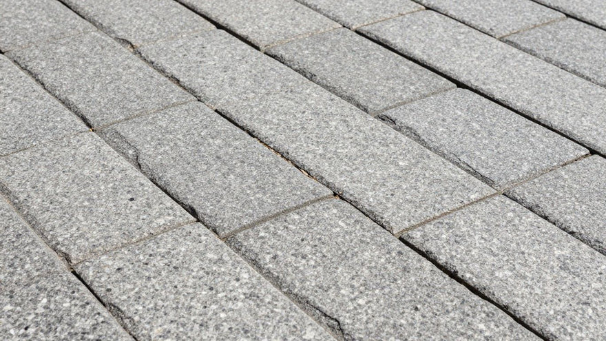 Granite paving stones in an outdoor patio setting.