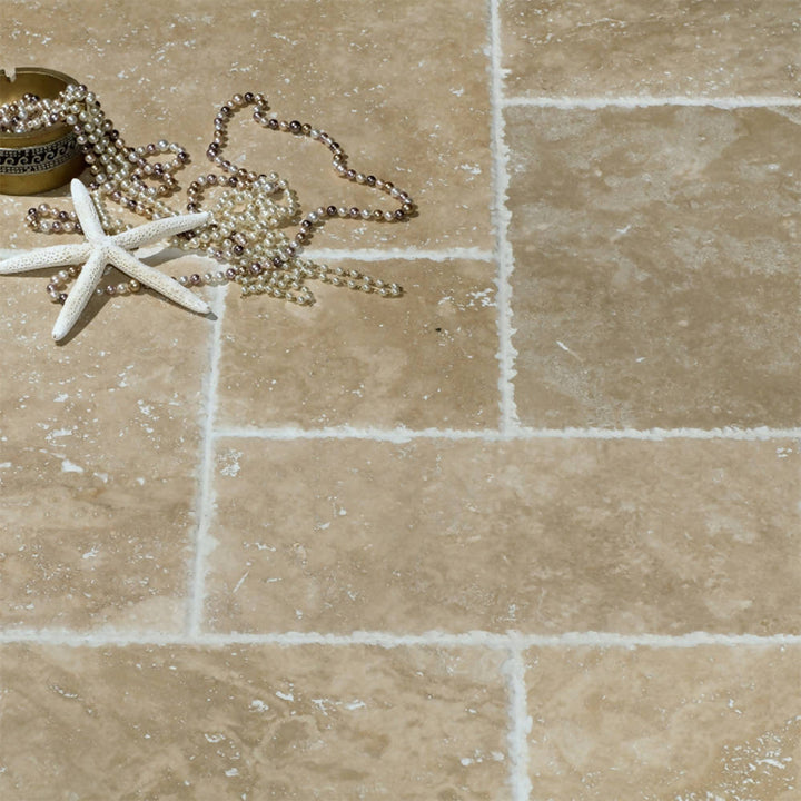 LYDIA KREMNA & CHISELLED EDGE TRAVERTINE TILES